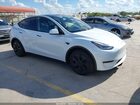 2025 Tesla Model Y Long Range Dual Motor All-wheel Drive White vin: 7SAYGAEE2SF291066