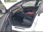 2025 Tesla Model Y Long Range Dual Motor All-wheel Drive White vin: 7SAYGAEE4SF283972