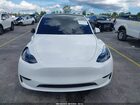 2025 Tesla Model Y Long Range Dual Motor All-wheel Drive White vin: 7SAYGAEE4SF283972
