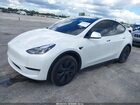 2025 Tesla Model Y Long Range Dual Motor All-wheel Drive White vin: 7SAYGAEE4SF283972