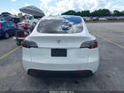 2025 Tesla Model Y Long Range Dual Motor All-wheel Drive White vin: 7SAYGAEE4SF283972