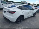 2025 Tesla Model Y Long Range Dual Motor All-wheel Drive White vin: 7SAYGAEE4SF283972