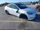 2022 Tesla Model Y Long Range Dual Motor All-wheel Drive White vin: 7SAYGAEEXNF468922