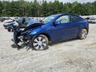 2024 Tesla Model Y Blue vin: 7SAYGDED1RF083330