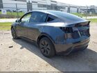 2025 Tesla Model Y Long Range Dual Motor Rear-wheel Drive Gray vin: 7SAYGDED6SA359486
