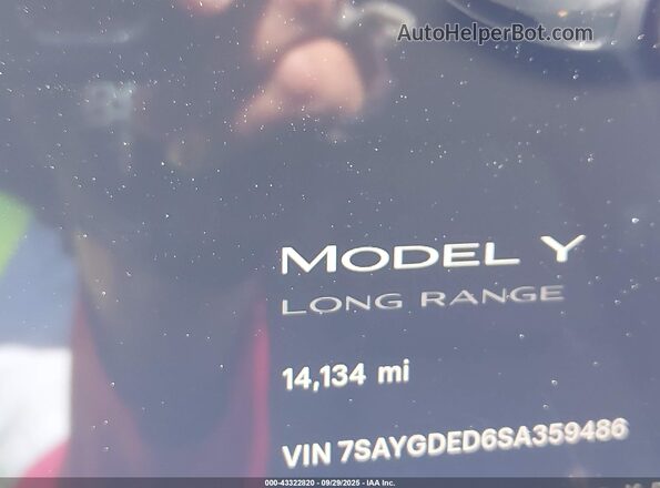 7SAYGDED6SA359486 2025 TESLA MODEL Y Gray Rear seats view
