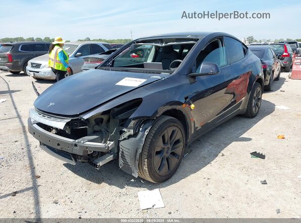 7SAYGDED6SA359486 2025 TESLA MODEL Y Gray Front left