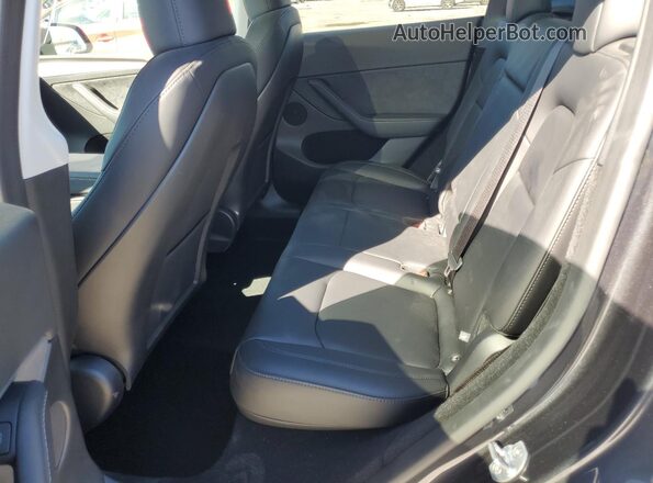 7SAYGDED7SF315080 2025 TESLA MODEL Gray Սալոնի հետևի տեսք