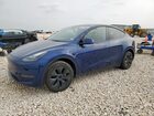 2024 Tesla Model Y Blue vin: 7SAYGDEDXRA327568