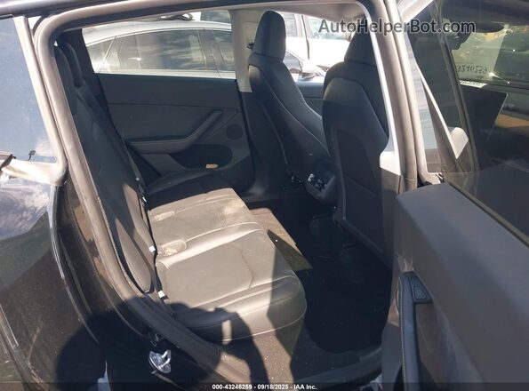 7SAYGDEE2SA356478 2025 TESLA MODEL Y Black VIN კოდის სტიკერის ხედი
