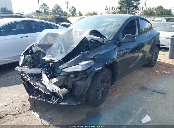 7SAYGDEE2SA356478 2025 TESLA MODEL Y Black წინა მარცხენა ხედი სამი მეოთხედიდან