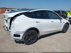 2025 Tesla Model Y Long Range Dual Motor All-wheel Drive White vin: 7SAYGDEE3SA343397