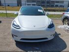2025 Tesla Model Y Long Range Dual Motor All-wheel Drive White vin: 7SAYGDEE3SA343397