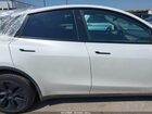 2025 Tesla Model Y Long Range Dual Motor All-wheel Drive White vin: 7SAYGDEE3SA343397