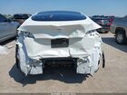 2025 Tesla Model Y Long Range Dual Motor All-wheel Drive White vin: 7SAYGDEE3SA343397