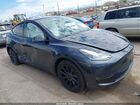 2024 Tesla Model Y Long Range Dual Motor All-wheel Drive Gray vin: 7SAYGDEE5RA225345