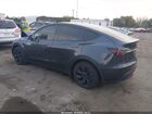 2025 Tesla Model Y Long Range Dual Motor All-wheel Drive Gray vin: 7SAYGDEE7SA346643
