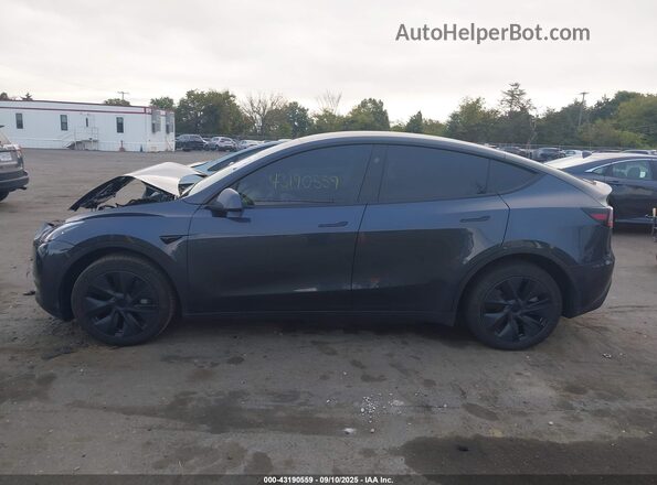 7SAYGDEE7SA346643 2025 TESLA MODEL Y Gray Vista interior trasera