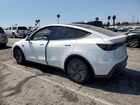 2026 Tesla Model Y White vin: 7SAYGDEE7TF348543