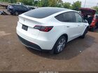 2023 Tesla Model Y Awd/long Range Dual Motor All-wheel Drive White vin: 7SAYGDEE8PA125043