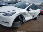 2023 Tesla Model Y Awd/long Range Dual Motor All-wheel Drive White vin: 7SAYGDEE8PA125043