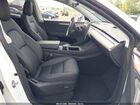 2023 Tesla Model Y Awd/long Range Dual Motor All-wheel Drive White vin: 7SAYGDEE8PA125043