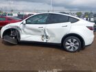 2023 Tesla Model Y Awd/long Range Dual Motor All-wheel Drive White vin: 7SAYGDEE8PA125043