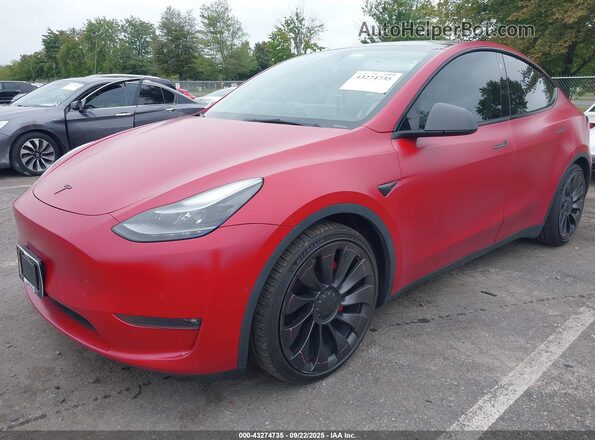 7SAYGDEF1NF509934 2022 TESLA MODEL Y Red Передня ліва чверть