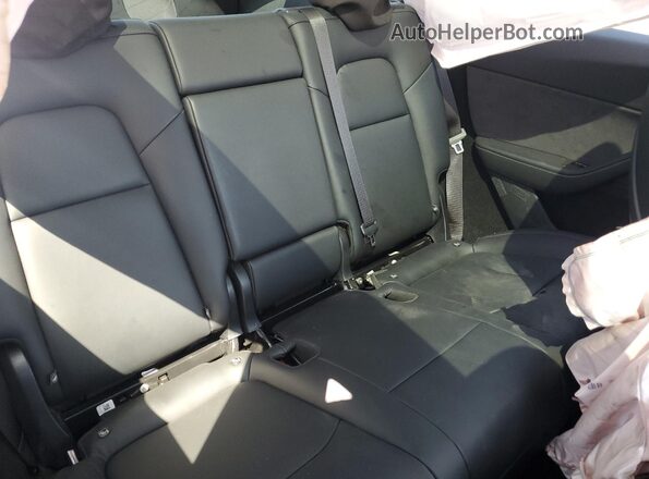 7SAYGDEF2SA377016 2025 TESLA MODEL Red Vista de los asientos traseros