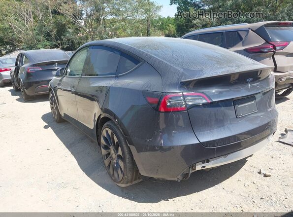 7SAYGDEF7SA371602 2025 TESLA MODEL Y Black უკანა მარცხენა