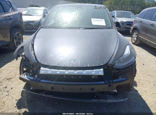 7SAYGDEF7SA371602 2025 TESLA MODEL Y Black წინა პანელის ხედი