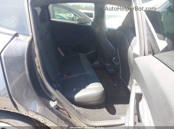 7SAYGDEF7SA371602 2025 TESLA MODEL Y Black VIN კოდის სტიკერის ხედი