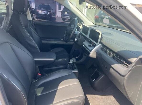 KM8KN4AE5NU082069 2022 HYUNDAI IONIQ Gray უკანა ხედი
