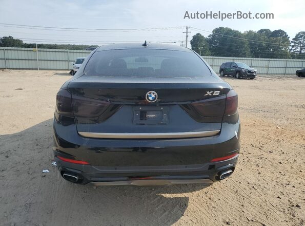 5UXKU2C50K0Z64910 2019 BMW X6 Черный Вид салона спереди