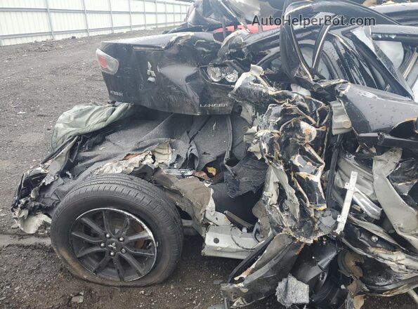 JA32U2FUXHU010203 2017 MITSUBISHI LANCER Black Vista de los asientos traseros