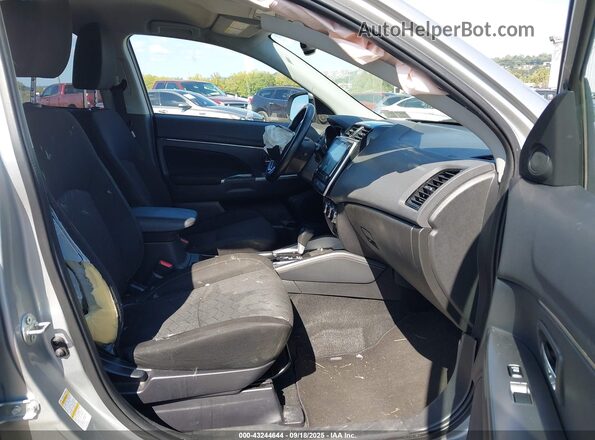 JA4APVAU5MU009638 2021 MITSUBISHI OUTLANDER SPORT Серебряный Вид салона спереди