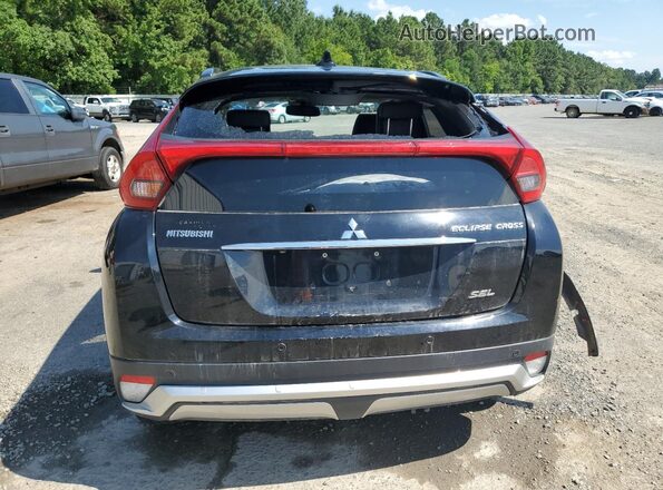 JA4AT5AA8JZ044982 2018 MITSUBISHI ECLIPSE Black Rear view