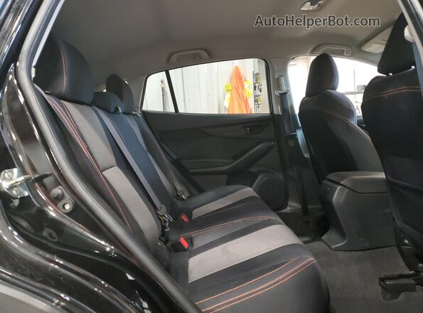 JF2GTABC9JH217098 2018 SUBARU CROSSTREK Черный Вид задней части салона