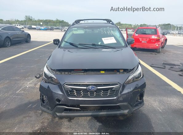 JF2GTAMC8J8344230 2018 SUBARU CROSSTREK Gray Rear interior view