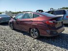 2018 Honda Clarity Burgundy vin: JHMZC5F10JC007797