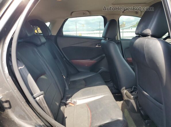 JM1DKFD70J0318272 2018 MAZDA CX-3 Gray უკანა სავარძლების ხედი