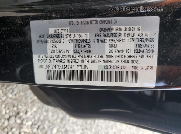 JM3TCBCY3J0200977 2018 MAZDA CX-9 Black VIN კოდის სტიკერის ხედი