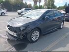 2024 Toyota Corolla Hybrid Le Gray vin: JTDBCMFE7R3064848