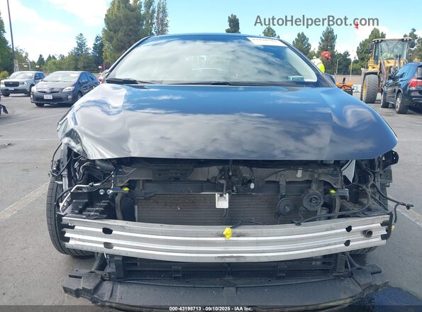 JTDBCMFE7R3064848 2024 TOYOTA LL Gray Front view