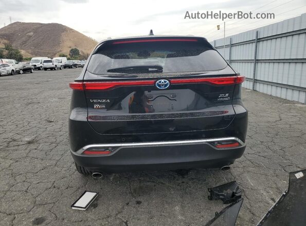 JTEAAAAH0NJ098469 2022 TOYOTA LE Black Rear view