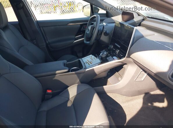 JTMABABA3RA082534 2024 SUBARU SOLTERRA Черный Вид салона спереди