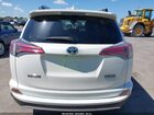 2016 Toyota Rav4 Hybrid Limited Белый vin: JTMDJREV2GD033723