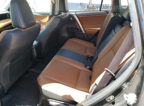 JTMDJREVXJD184560 2018 TOYOTA LIMITED Black Rear interior view