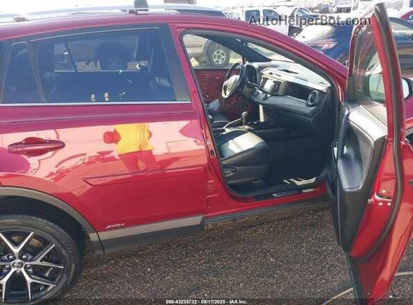 JTMJJREV2JD237089 2018 TOYOTA RAV4 HYBRID Red Widok wnętrza z przodu