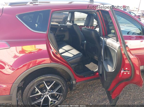 JTMJJREV2JD237089 2018 TOYOTA RAV4 HYBRID Red Widok naklejki z numerem VIN